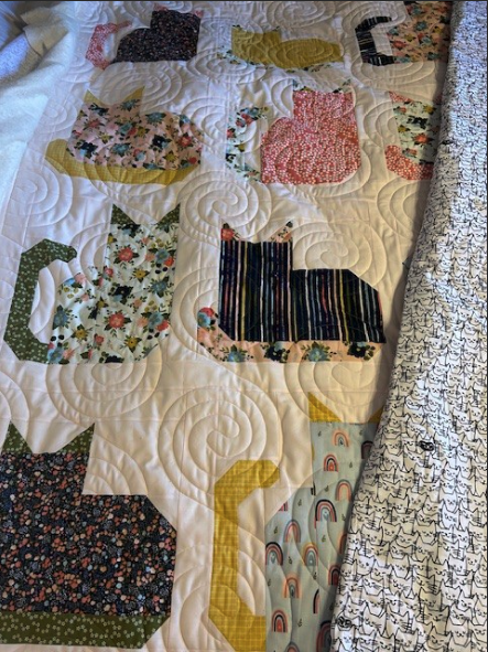 Colorful quilt work by 702 Quilting